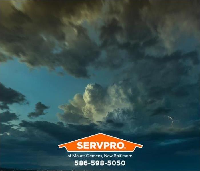 Clouds from a passing storm are seen in the evening sky.